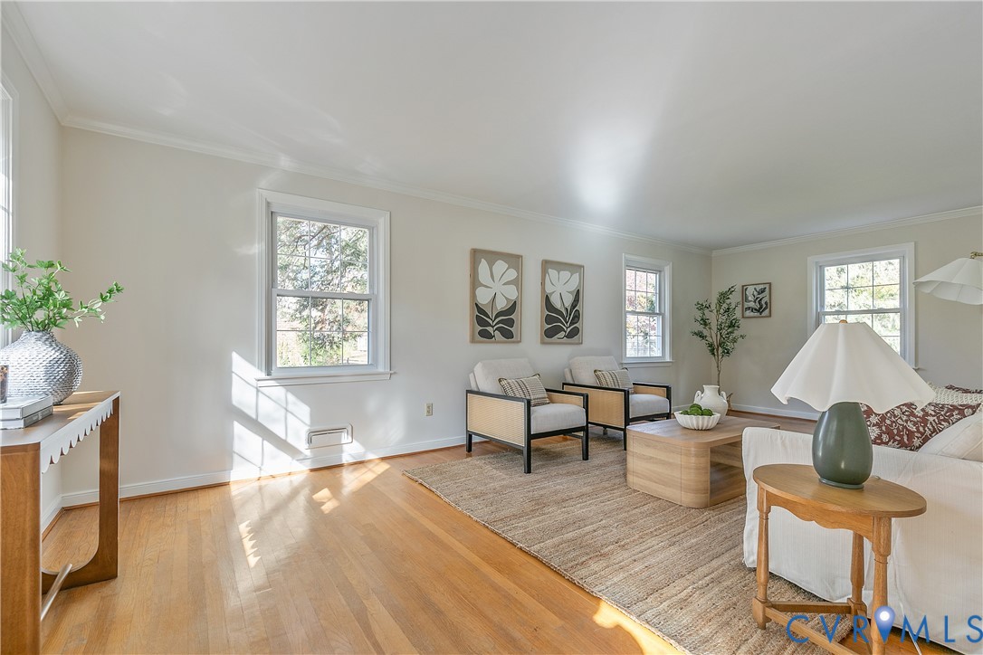 10200 Merrigan Road Richmond, VA 23235 - Photo 12 of 47 a living room with furniture and a wooden floor
