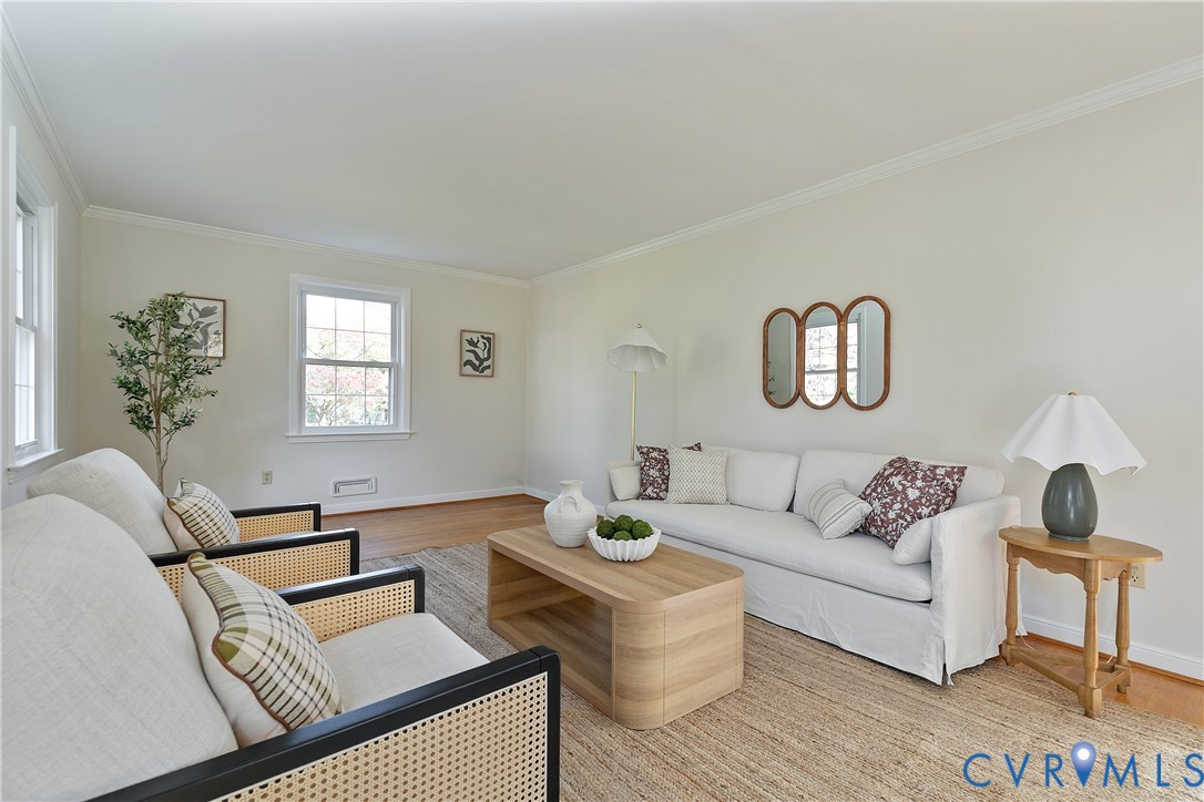 10200 Merrigan Road Richmond, VA 23235 - Photo 14 of 47 a living room with furniture and a wooden floor