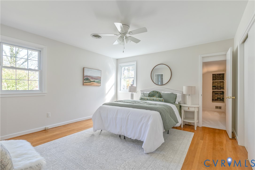 10200 Merrigan Road Richmond, VA 23235 - Photo 30 of 47 a bedroom with a bed and window