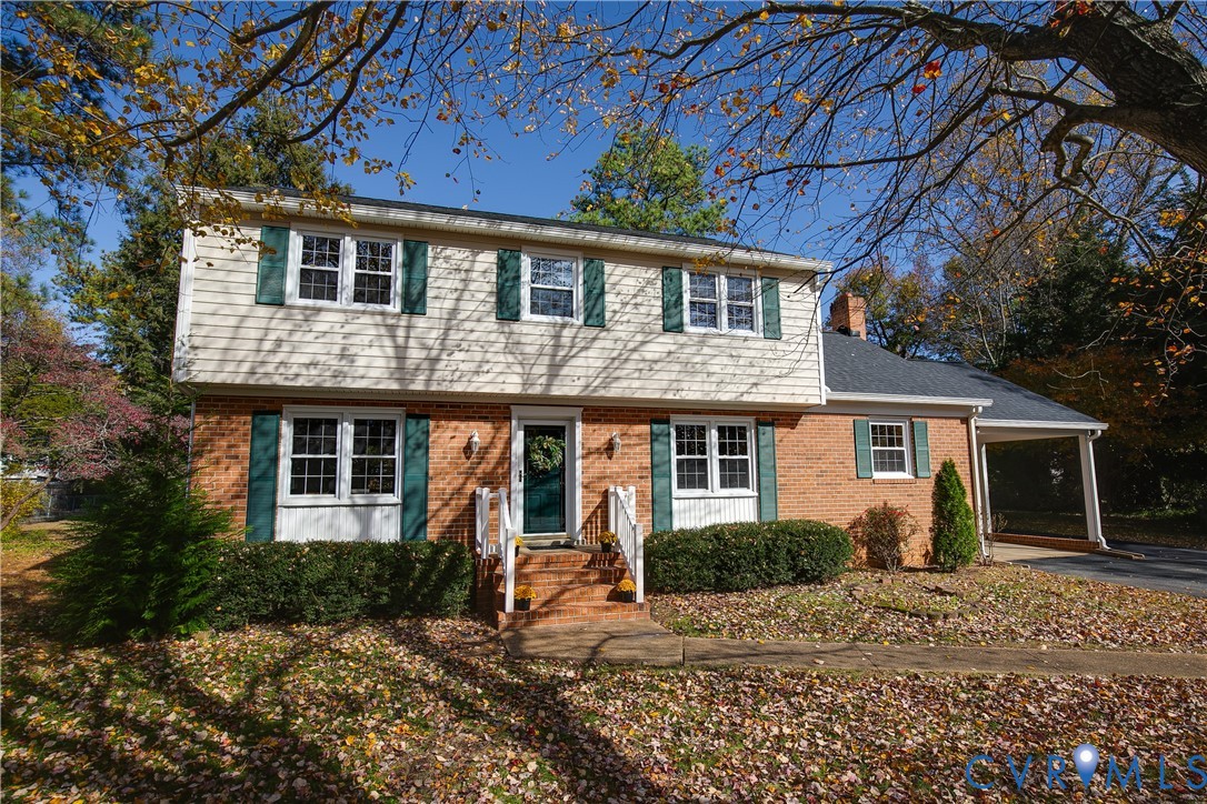 10200 Merrigan Road Richmond, VA 23235 - Photo 3 of 47 a view of a house with a patio
