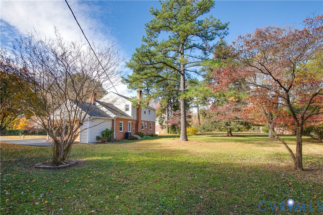 10200 Merrigan Road Richmond, VA 23235 - Photo 45 of 47 a view of a trees in front of a house