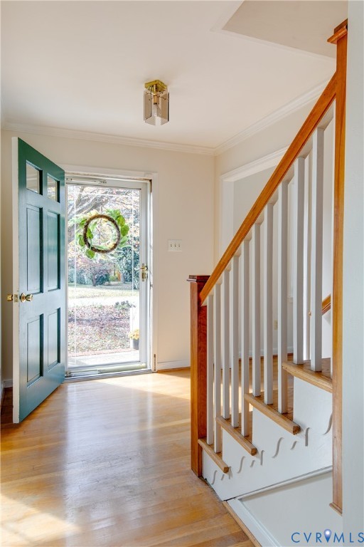 10200 Merrigan Road Richmond, VA 23235 - Photo 10 of 47 a view of an entryway with wooden floor and windows