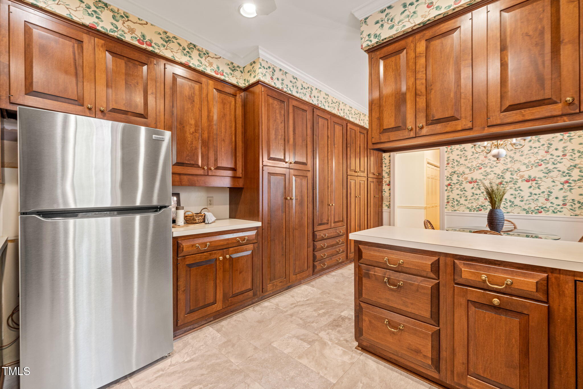 2209 Ridgefield Drive Chapel Hill, NC 27517 - Photo 13 of 57 a kitchen with stainless steel appliances granite countertop a refrigerator a stove and a sink