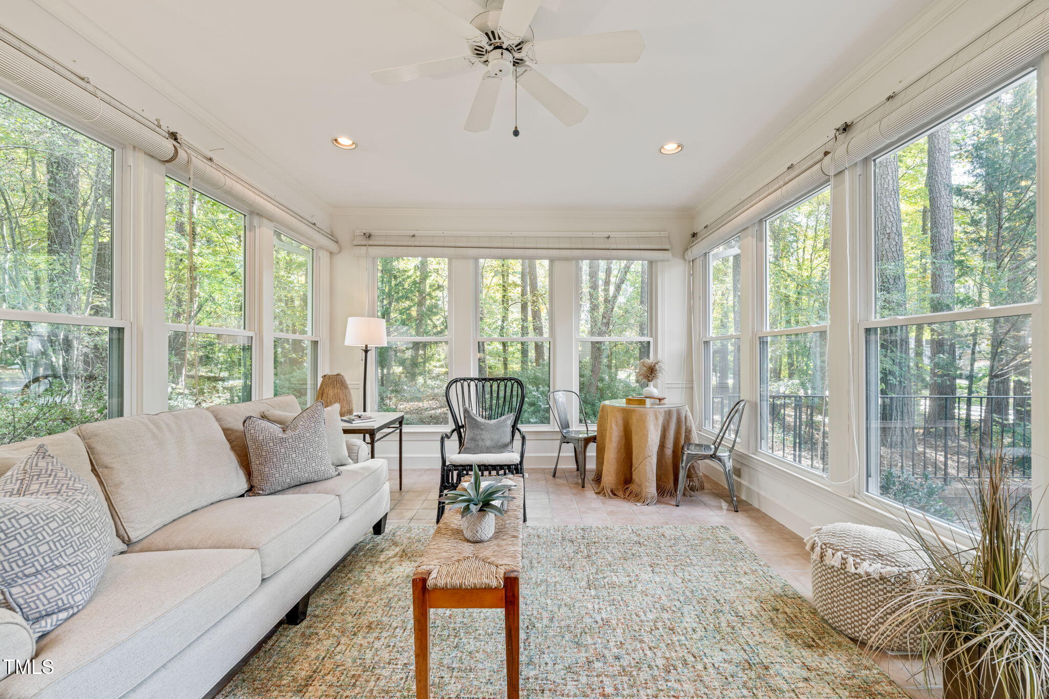 2209 Ridgefield Drive Chapel Hill, NC 27517 - Photo 18 of 57 a living room with furniture and floor to ceiling windows