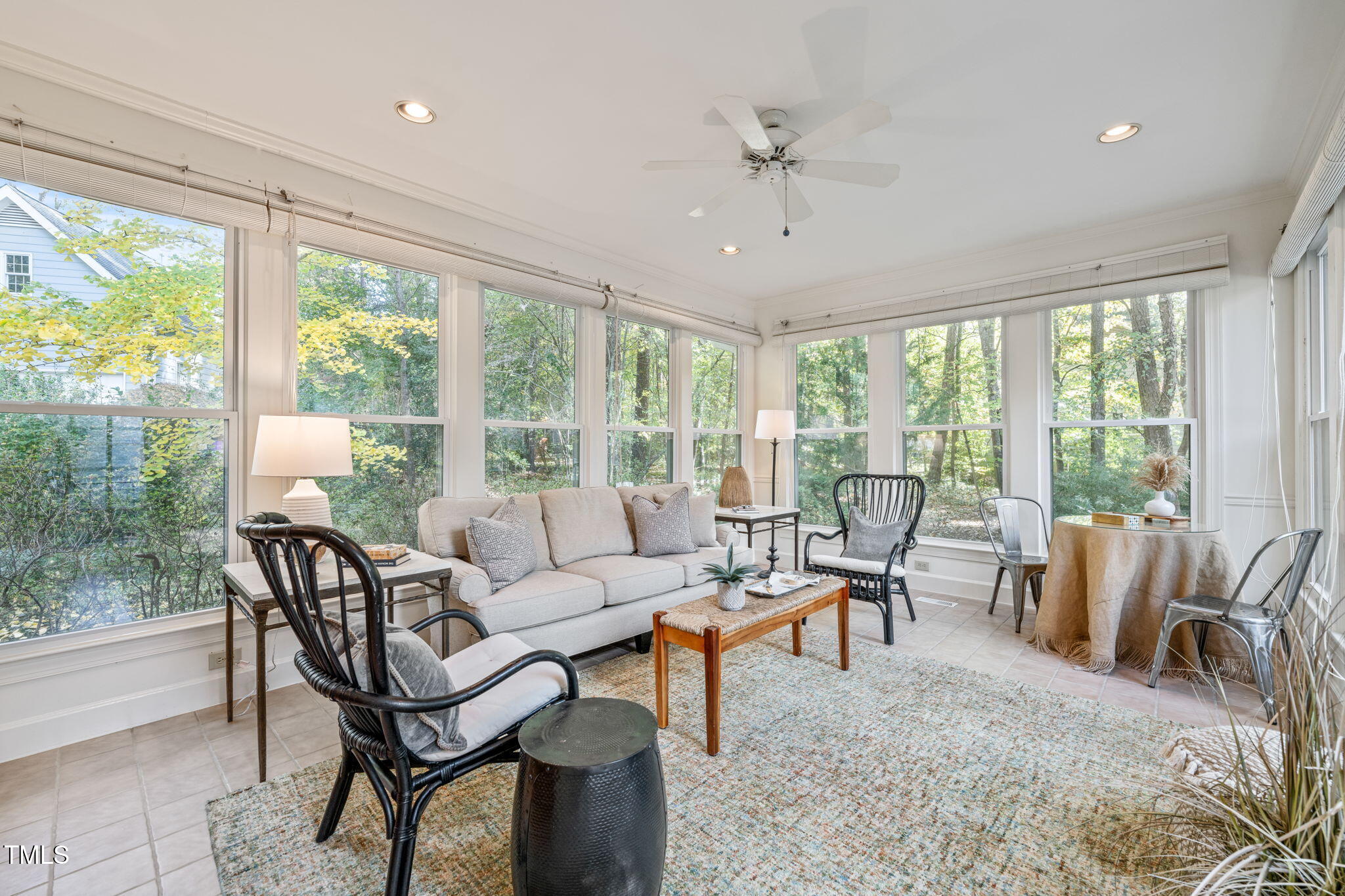 2209 Ridgefield Drive Chapel Hill, NC 27517 - Photo 19 of 57 a living room with furniture and a large window