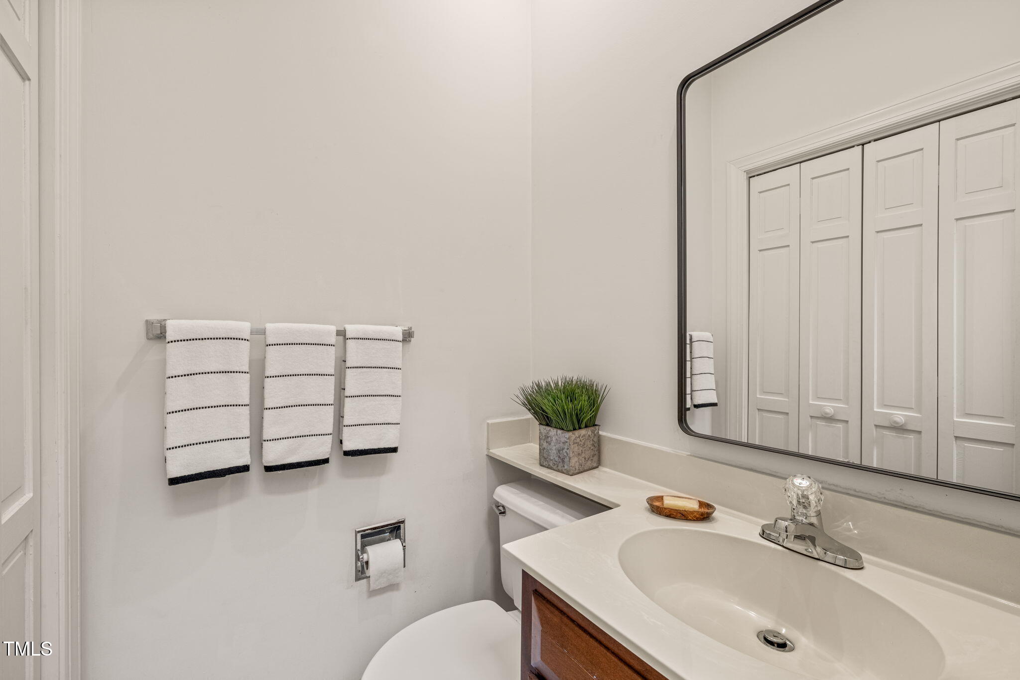 2209 Ridgefield Drive Chapel Hill, NC 27517 - Photo 35 of 57 a bathroom with a sink toilet and vanity