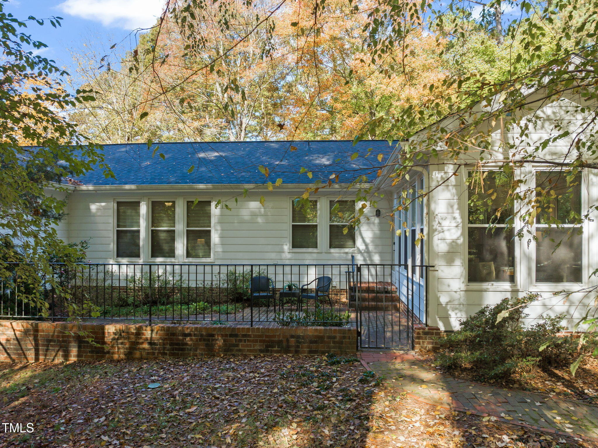 2209 Ridgefield Drive Chapel Hill, NC 27517 - Photo 39 of 57 a front view of a house with a garden