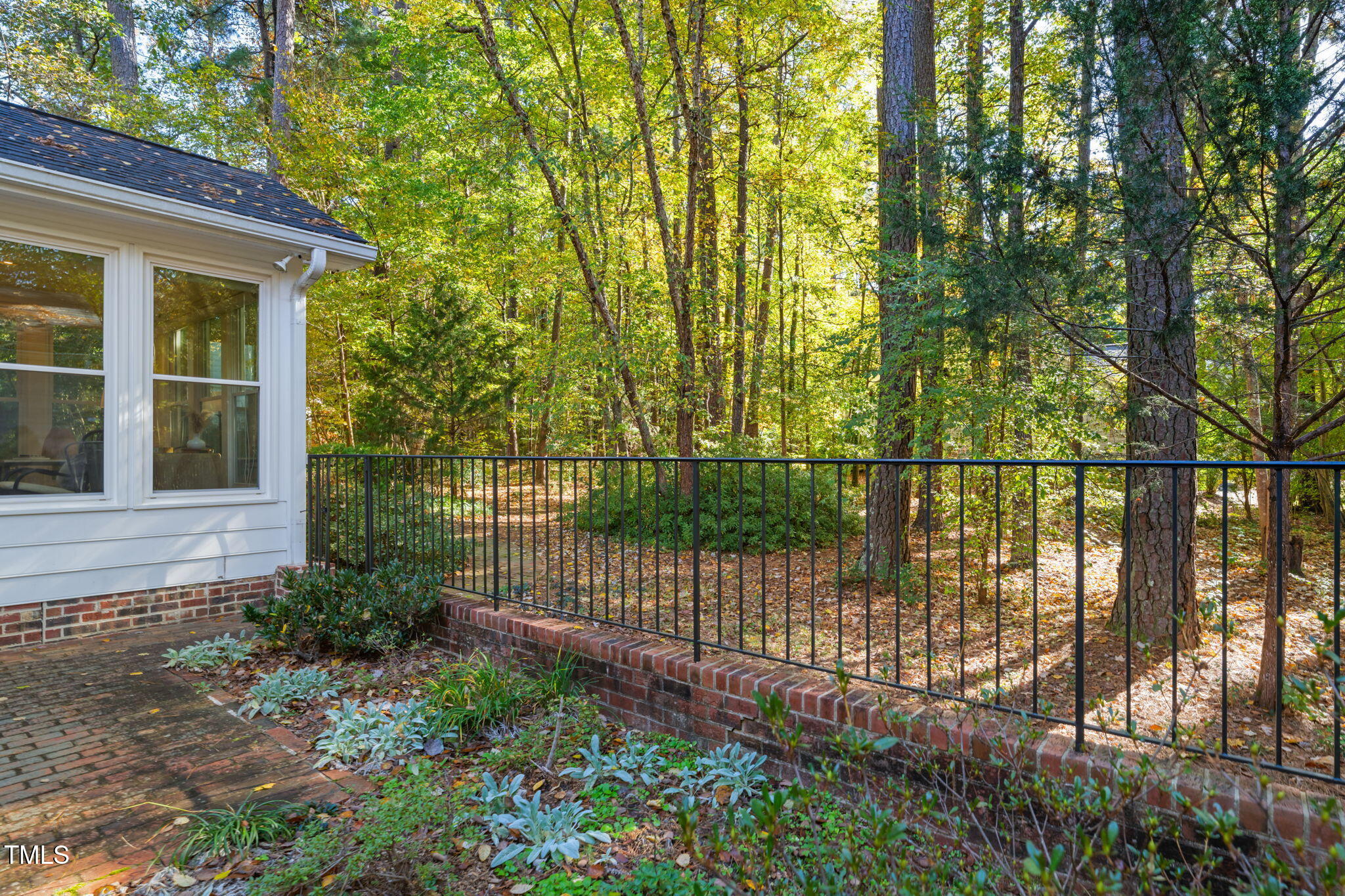 2209 Ridgefield Drive Chapel Hill, NC 27517 - Photo 42 of 57 a view of a house with a backyard