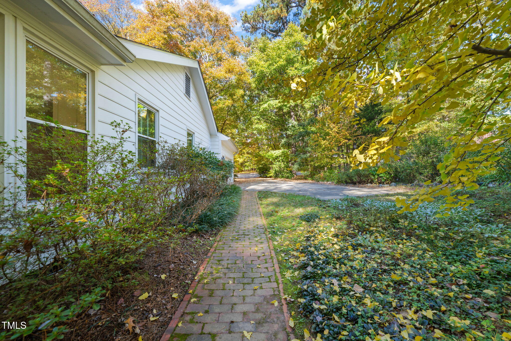 2209 Ridgefield Drive Chapel Hill, NC 27517 - Photo 45 of 57 a backyard of a house with lots of green space