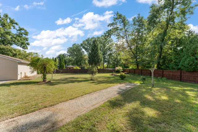 a house view with a garden space