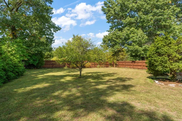 a picture of a bathroom with a shower