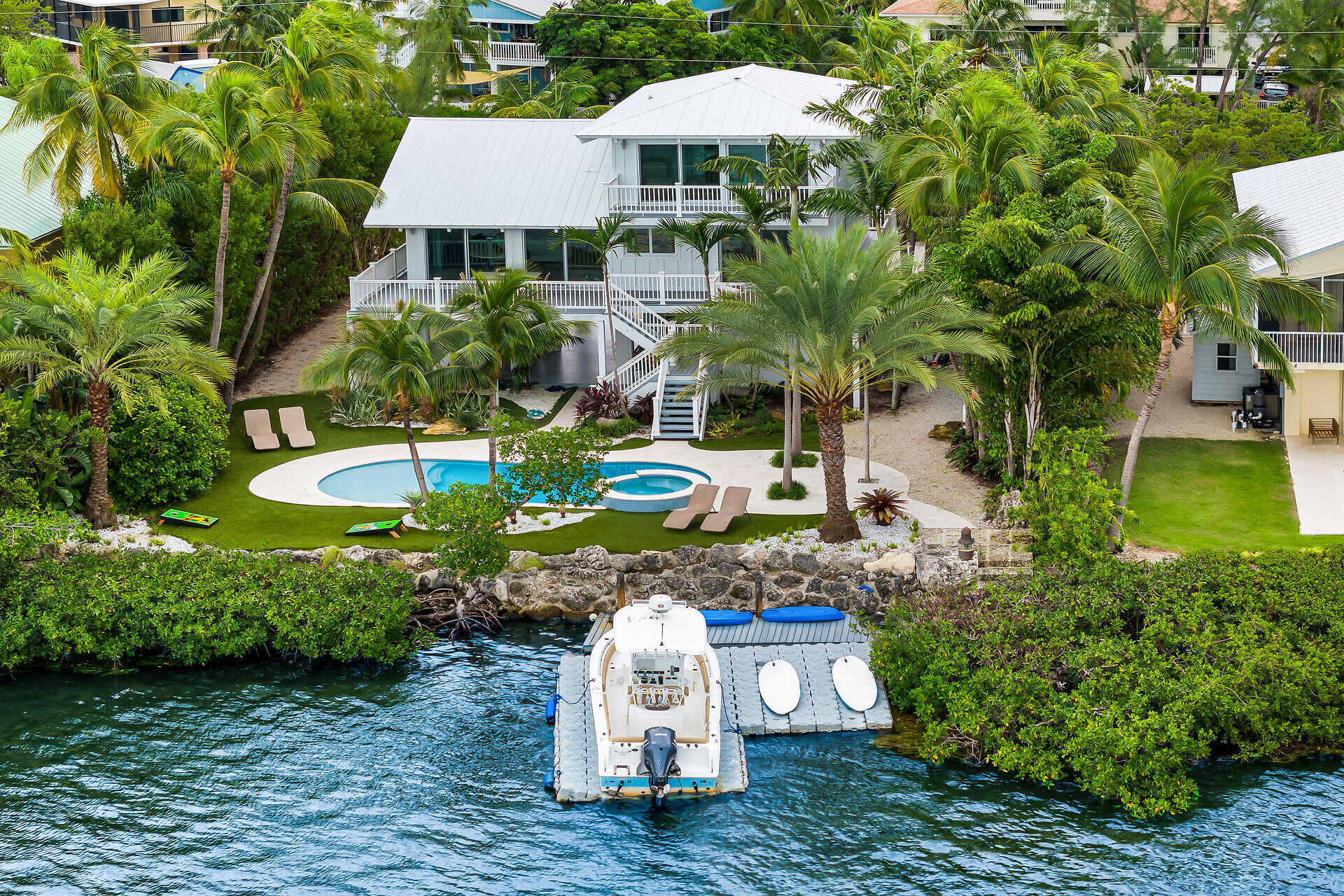 116 Gulf Side Drive Islamorada, FL 33036 - Photo 12 of 67 a view of a backyard with plants and patio