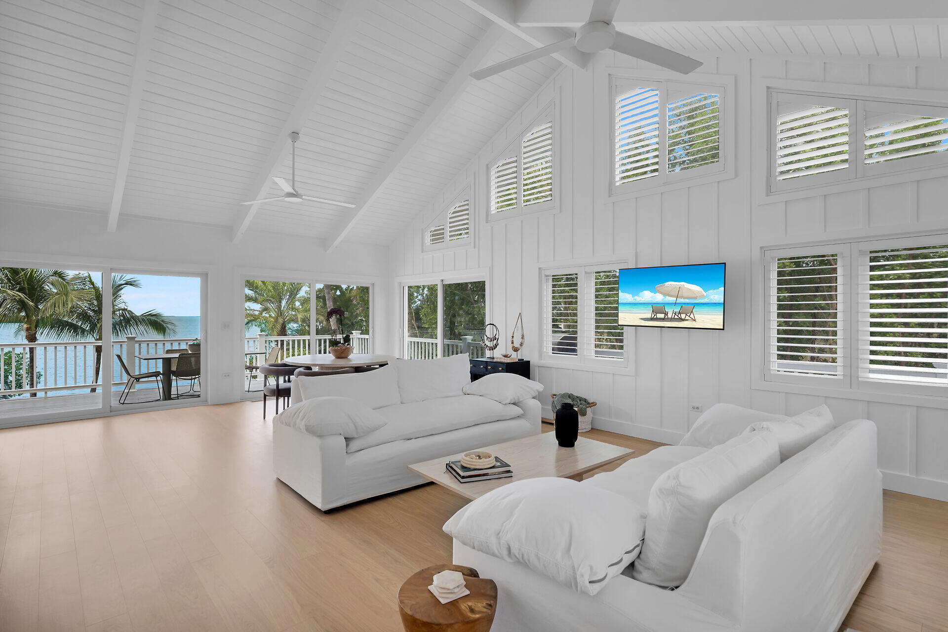 116 Gulf Side Drive Islamorada, FL 33036 - Photo 27 of 67 a living room with furniture and a large window