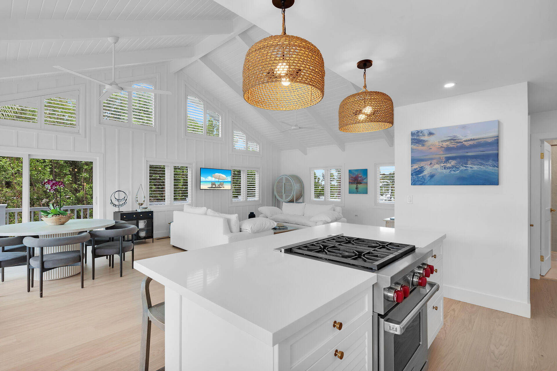 116 Gulf Side Drive Islamorada, FL 33036 - Photo 31 of 67 a kitchen that has a lot of cabinets stainless steel appliances and a large window