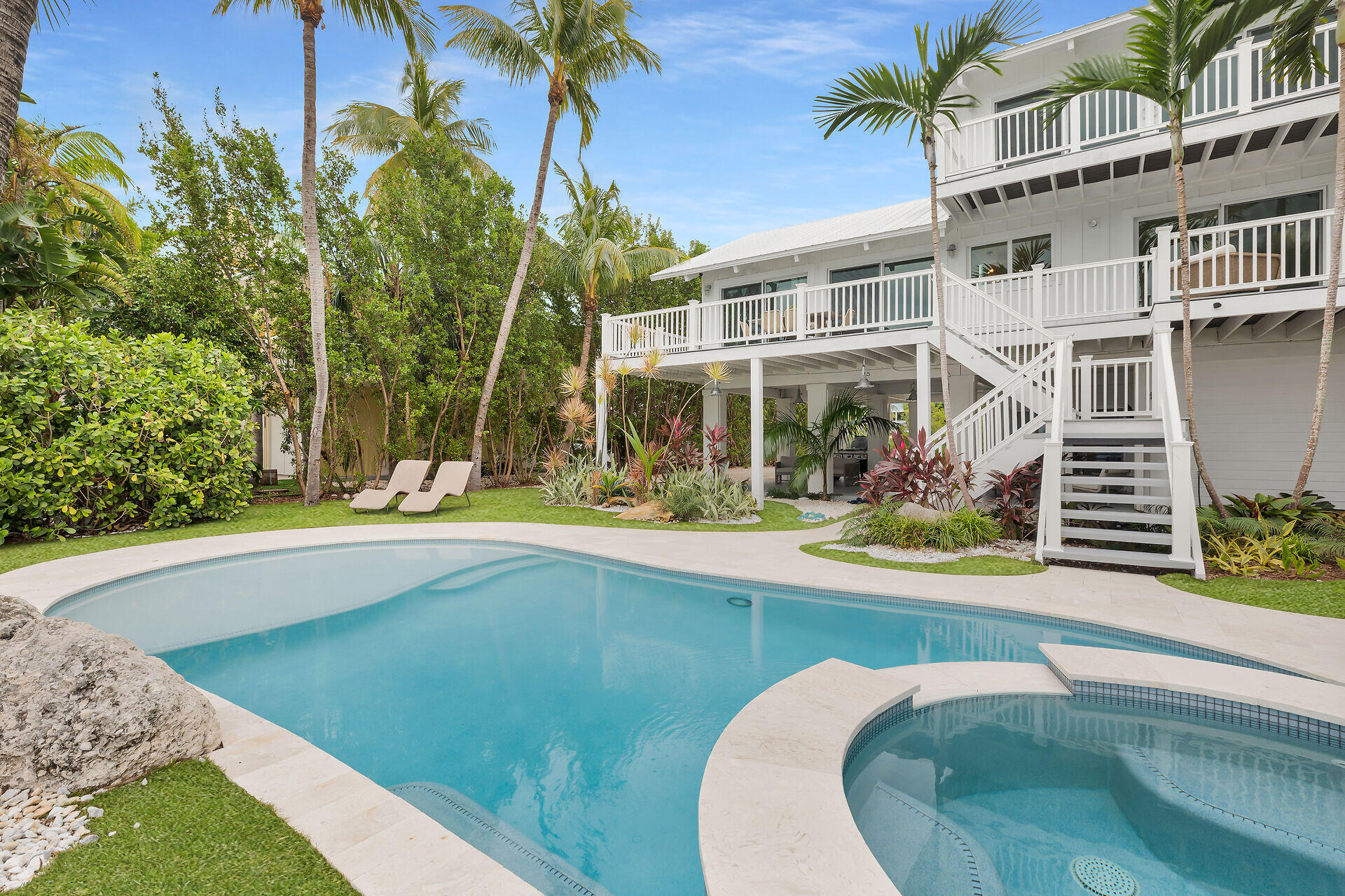 116 Gulf Side Drive Islamorada, FL 33036 - Photo 55 of 67 a view of a house with swimming pool and porch