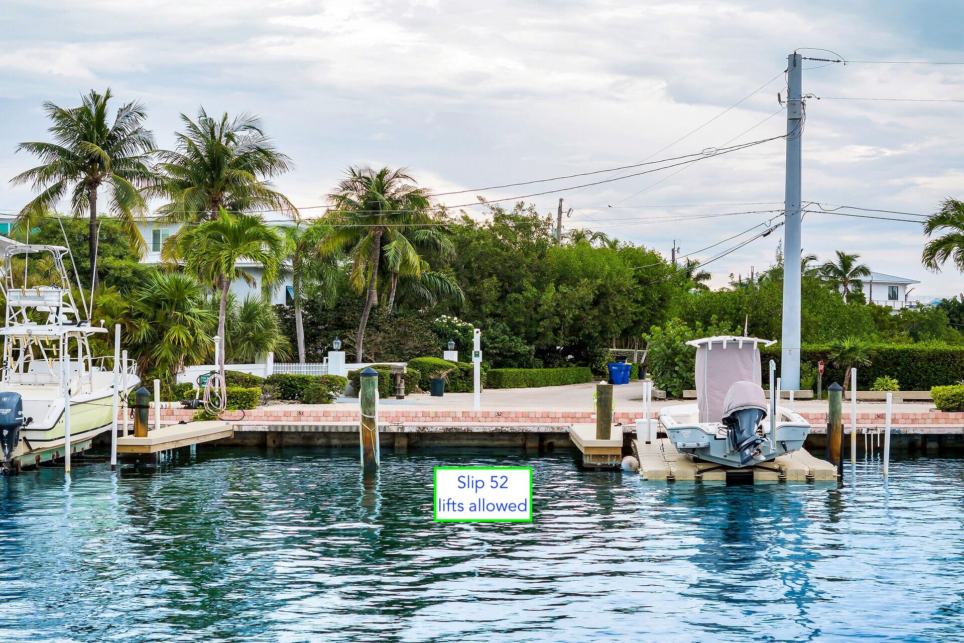 116 Gulf Side Drive Islamorada, FL 33036 - Photo 7 of 67 a view of water with boats and trees around