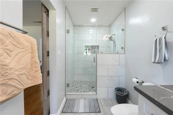a bathroom with a sink and toilet