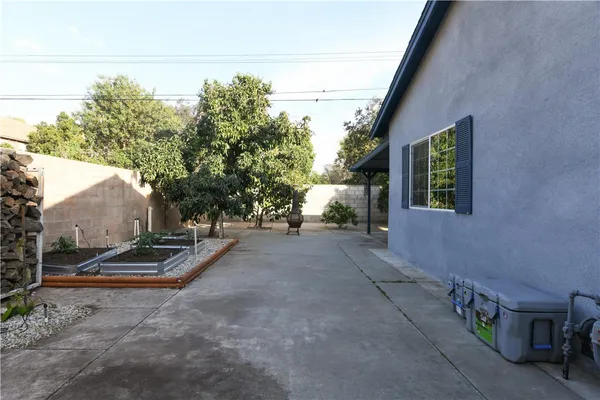 a view of outdoor space with deck and furniture