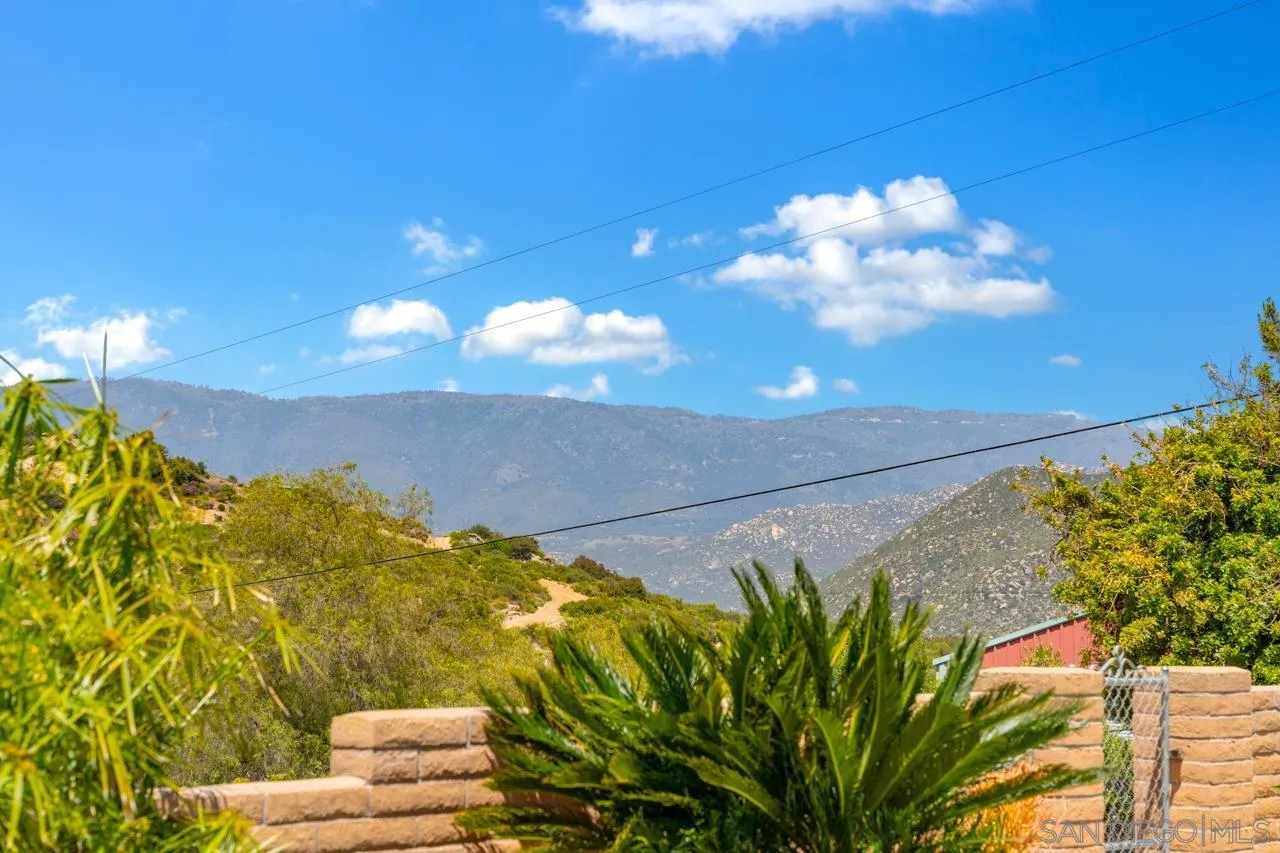 31478 Valley Center Road Valley Center, CA 92082 - Photo 45 of 66 a view of a yard with an outdoor space