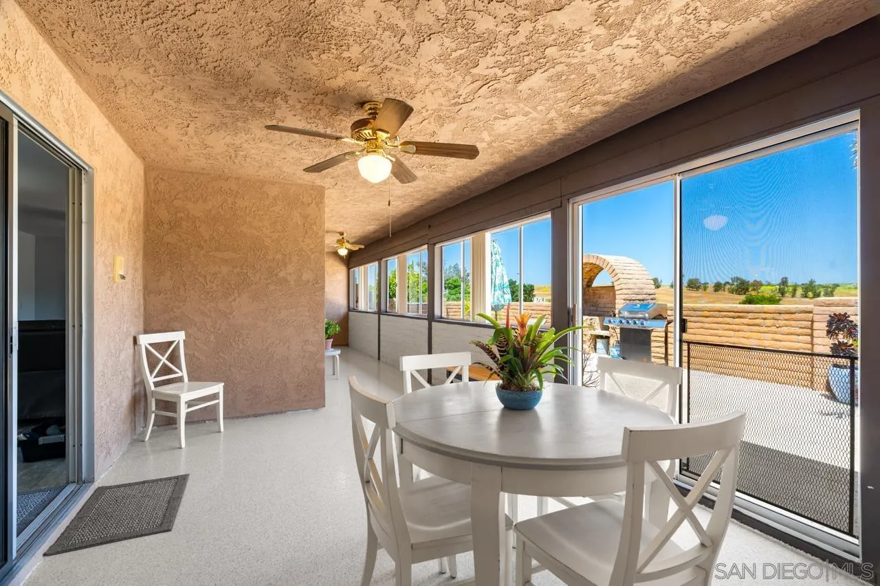 31478 Valley Center Road Valley Center, CA 92082 - Photo 46 of 66 a view of a dining room with furniture window and outside view