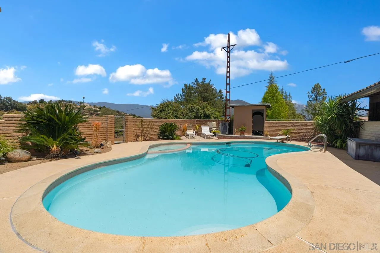 31478 Valley Center Road Valley Center, CA 92082 - Photo 49 of 66 a view of a swimming pool with a patio