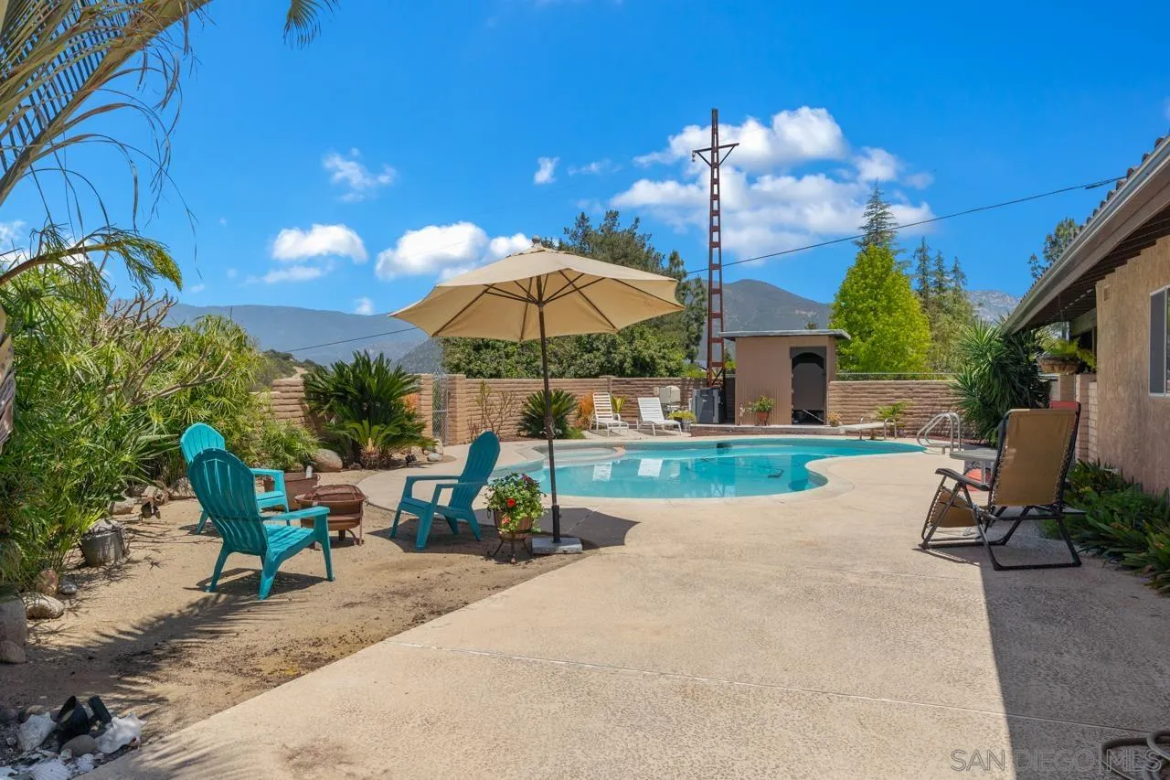 31478 Valley Center Road Valley Center, CA 92082 - Photo 50 of 66 a view of a backyard with sitting area and furniture