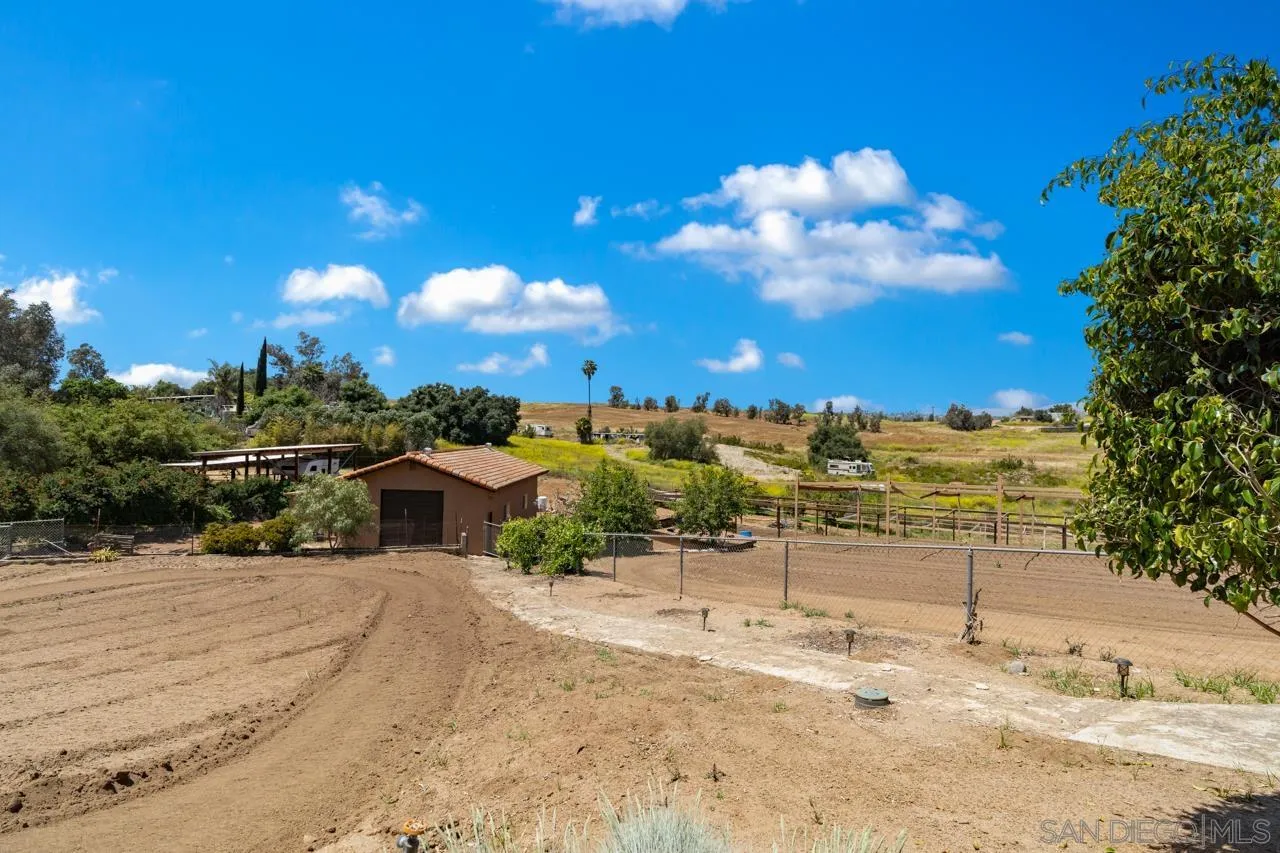 31478 Valley Center Road Valley Center, CA 92082 - Photo 54 of 66 a view of a yard with a house