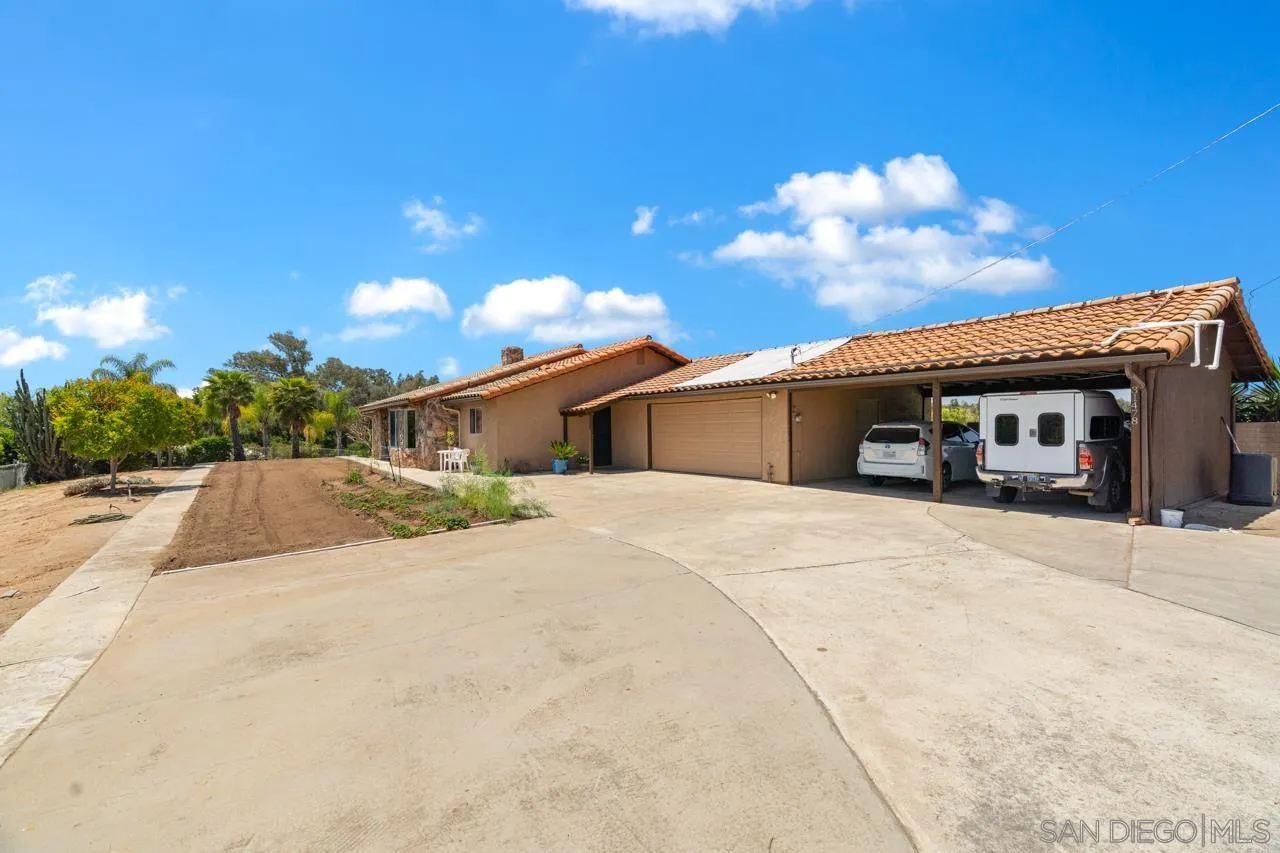 31478 Valley Center Road Valley Center, CA 92082 - Photo 59 of 66 a view of a house with a patio