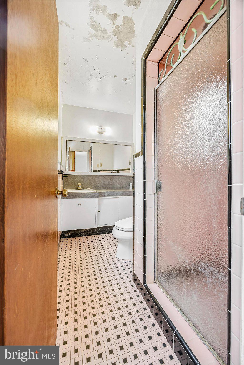 675 Trephanny Lane Wayne, PA 19087 - Photo 13 of 36 a bathroom with a glass shower door