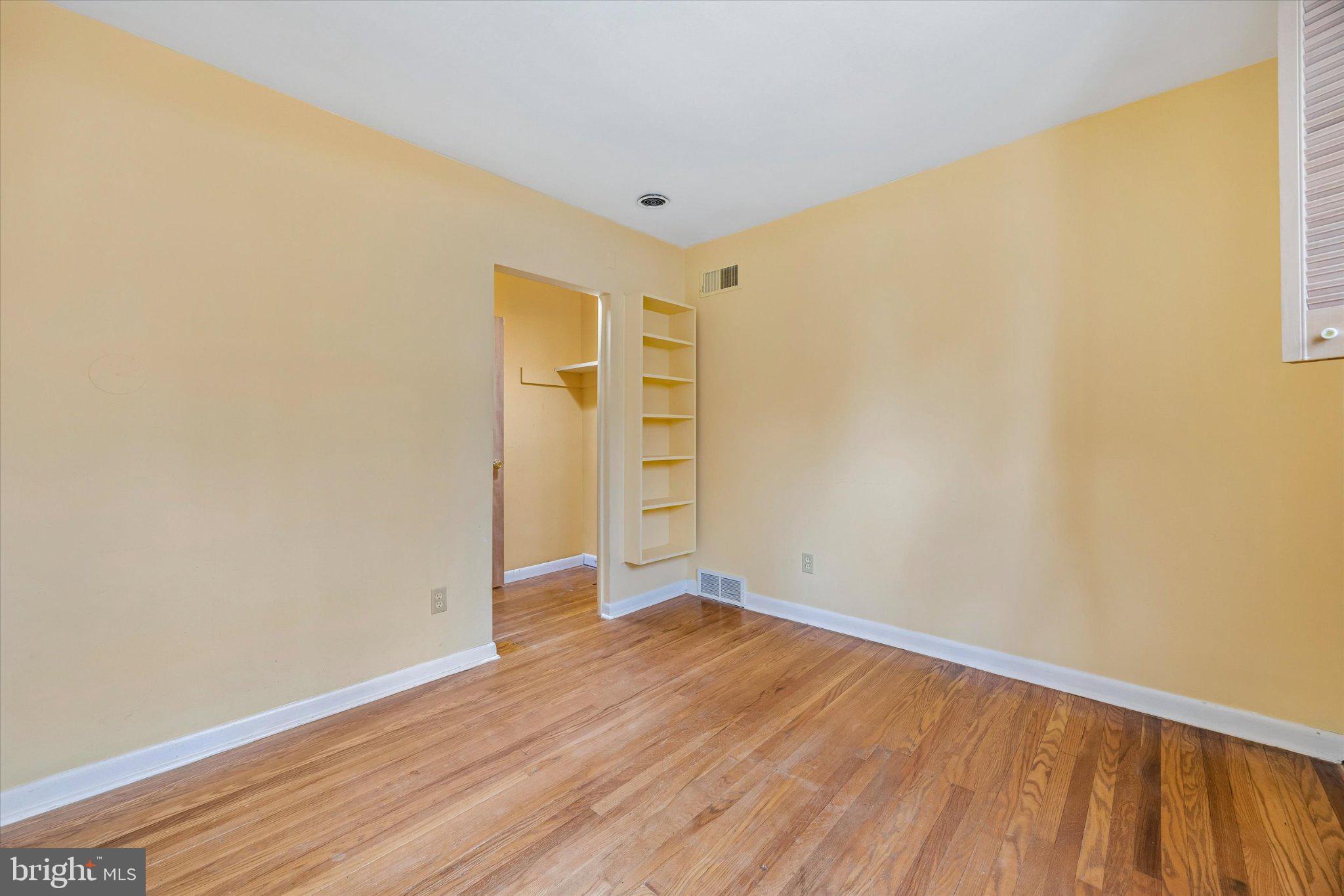 675 Trephanny Lane Wayne, PA 19087 - Photo 18 of 36 a view of an empty room with wooden floor