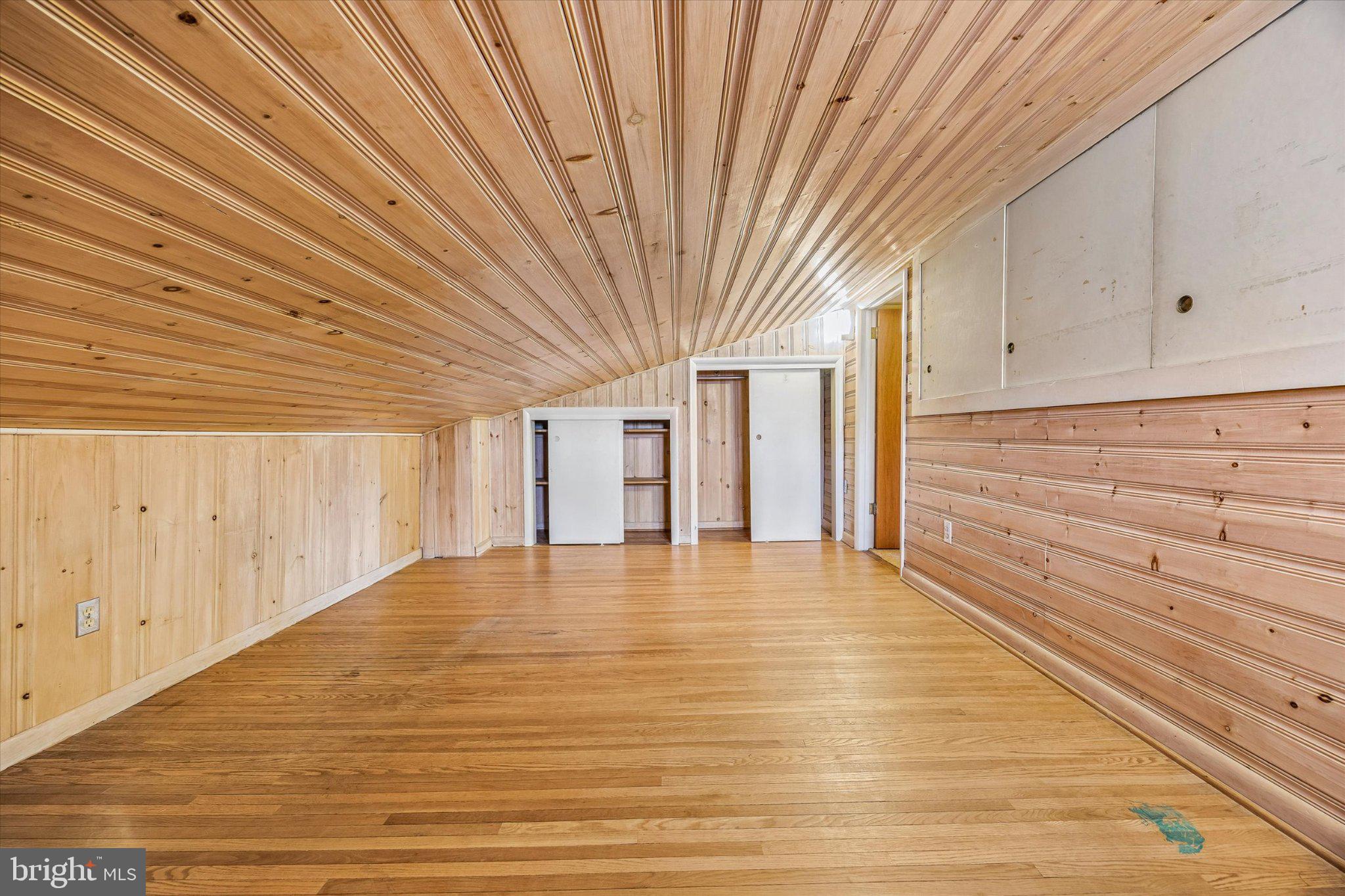 675 Trephanny Lane Wayne, PA 19087 - Photo 20 of 36 a view of an empty room with wooden floor and entryway