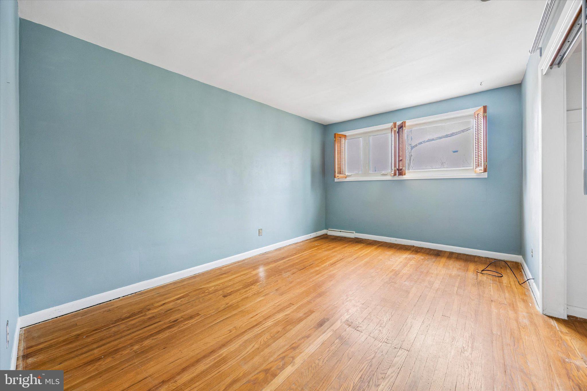 675 Trephanny Lane Wayne, PA 19087 - Photo 23 of 36 a view of empty room with wooden floor