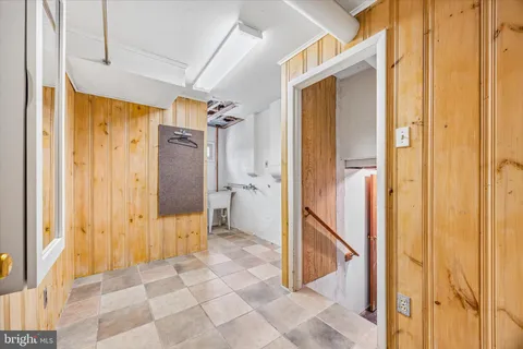 a view of a bathroom with a tub and shower