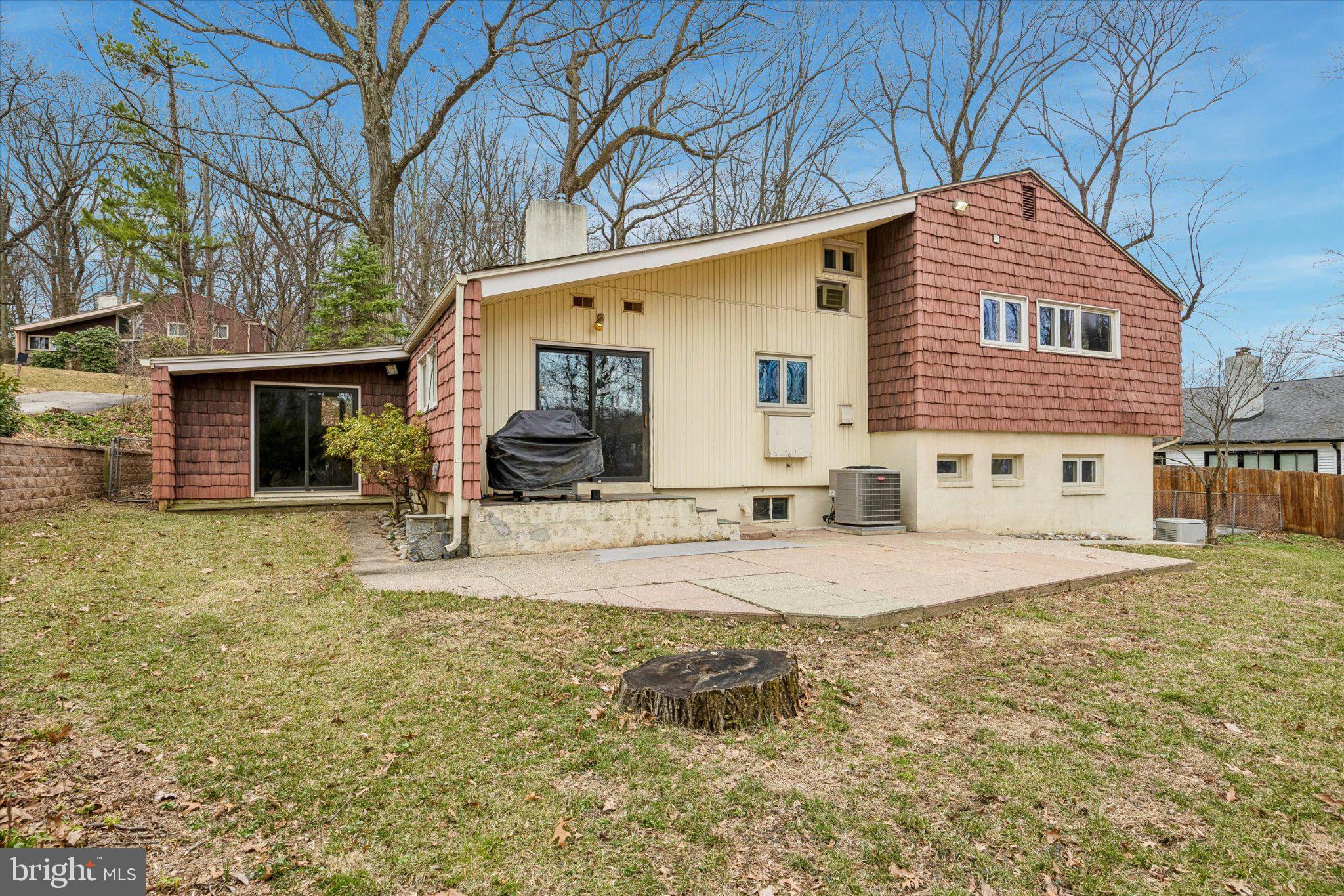 675 Trephanny Lane Wayne, PA 19087 - Photo 32 of 36 a front view of a house with a yard and garage