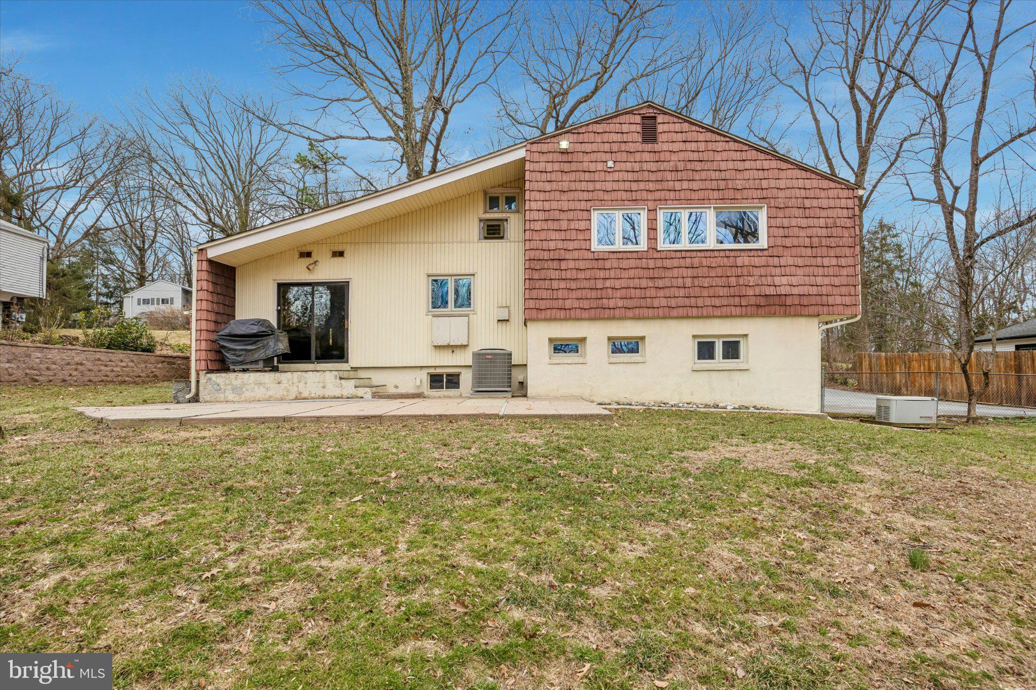 675 Trephanny Lane Wayne, PA 19087 - Photo 33 of 36 a view of a house with a yard