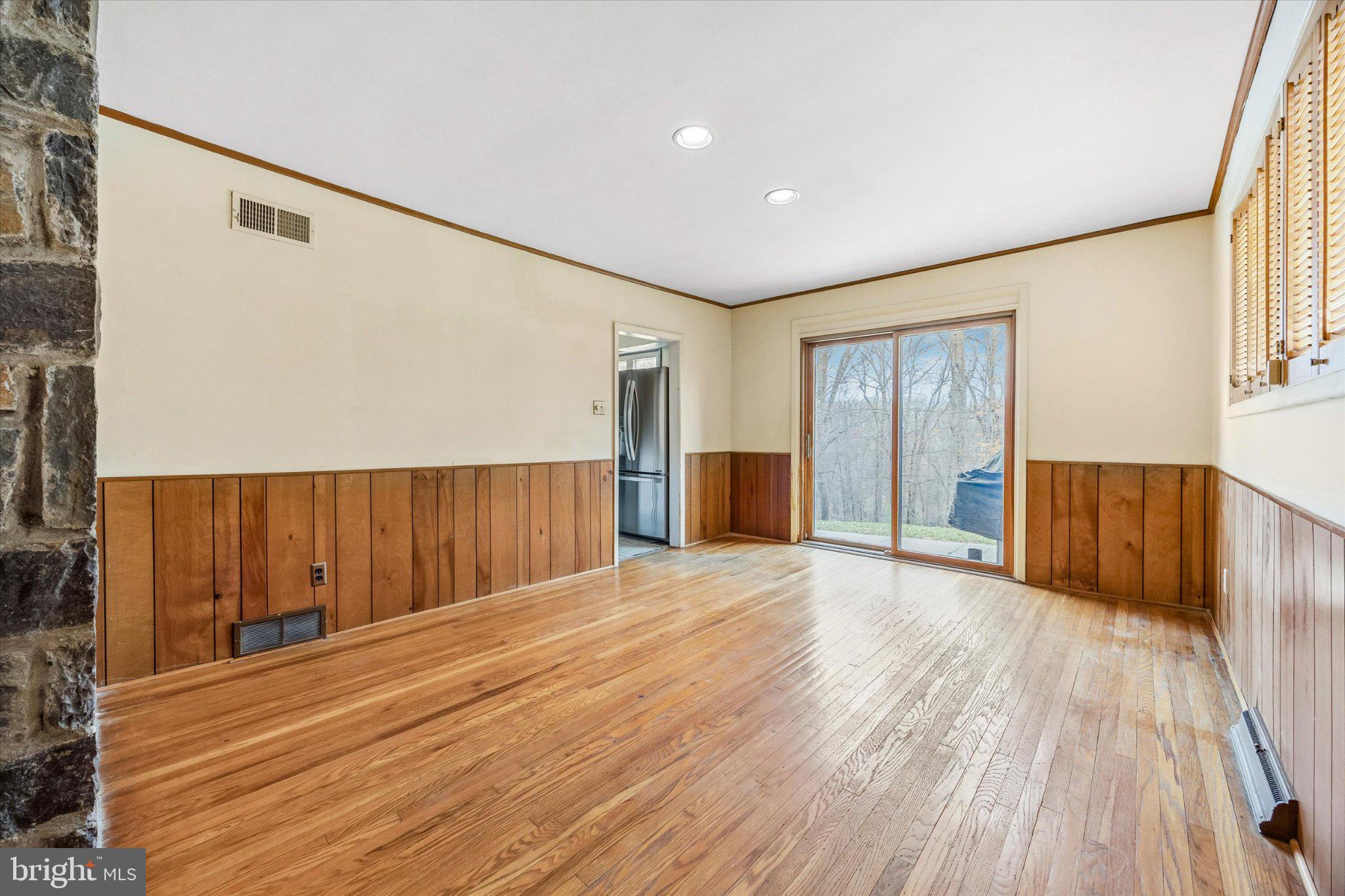 675 Trephanny Lane Wayne, PA 19087 - Photo 7 of 36 a view of empty room with wooden floor