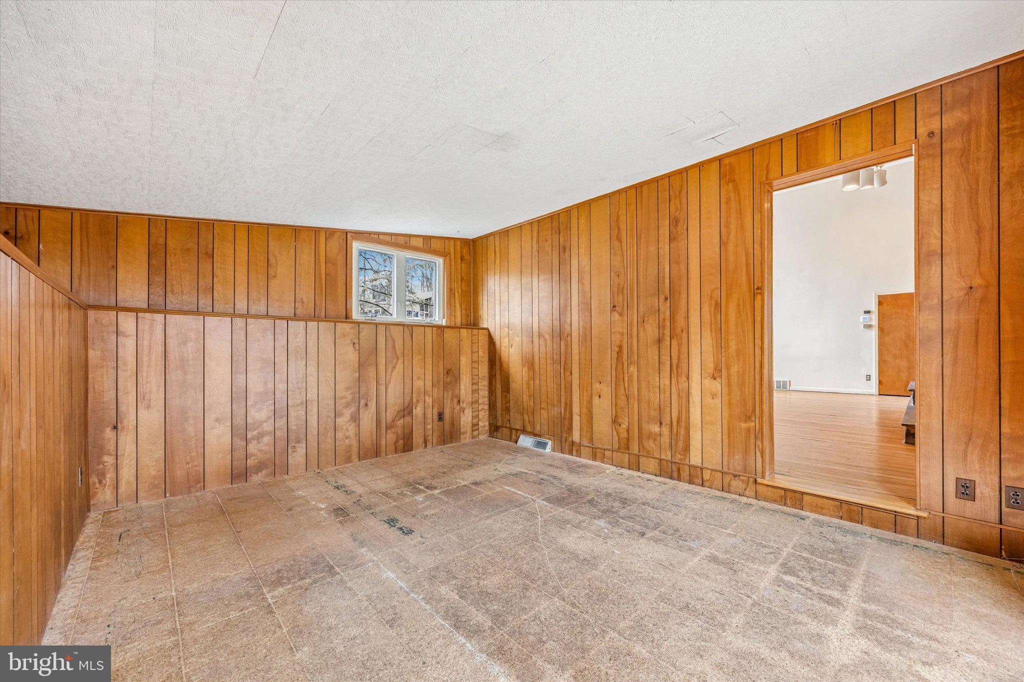 675 Trephanny Lane Wayne, PA 19087 - Photo 8 of 36 a view of an empty room with a window