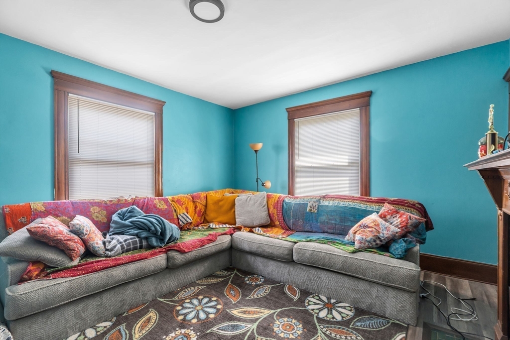 102 Florida Street Springfield, MA 01109 - Photo 24 of 45 a living room with furniture and a couch
