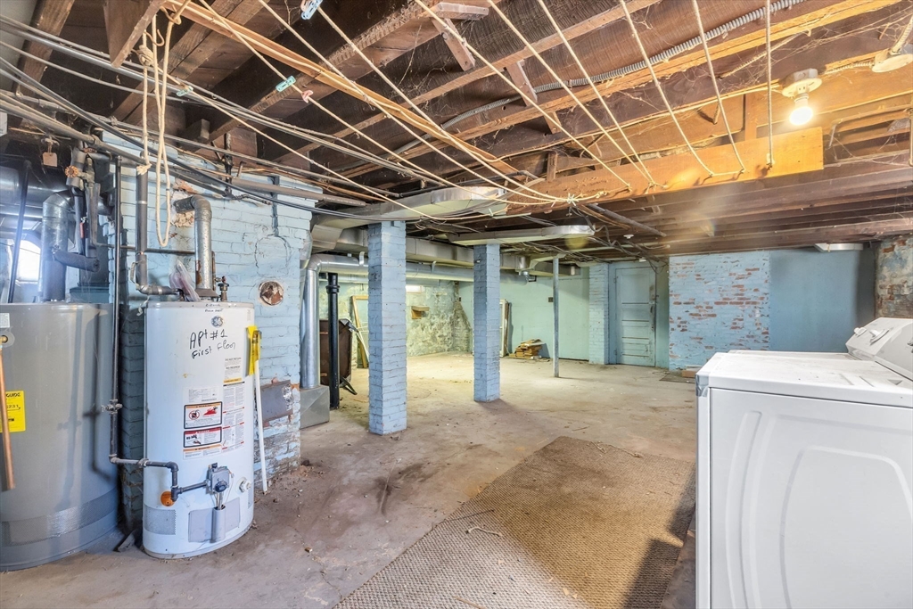 102 Florida Street Springfield, MA 01109 - Photo 33 of 45 a view of a garage with refrigerator