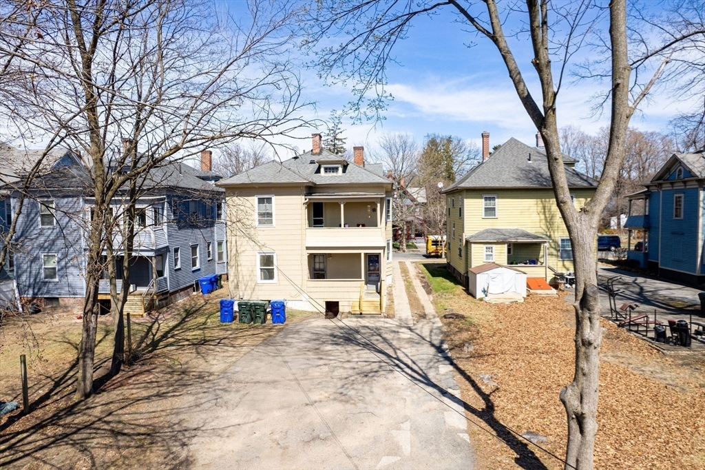 102 Florida Street Springfield, MA 01109 - Photo 37 of 45 a view of a building with snow on the road