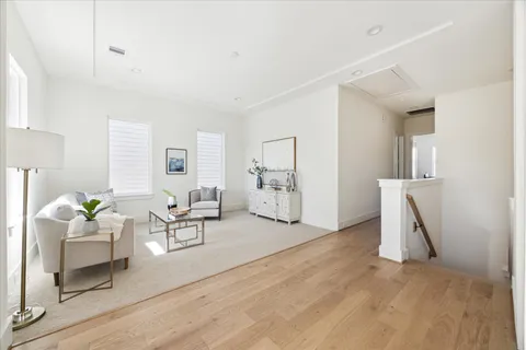 a bathroom with a double vanity sink mirror and