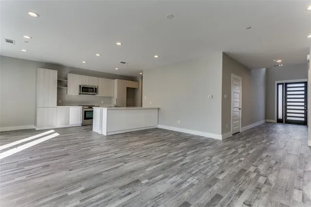 front view of brick house with a yard