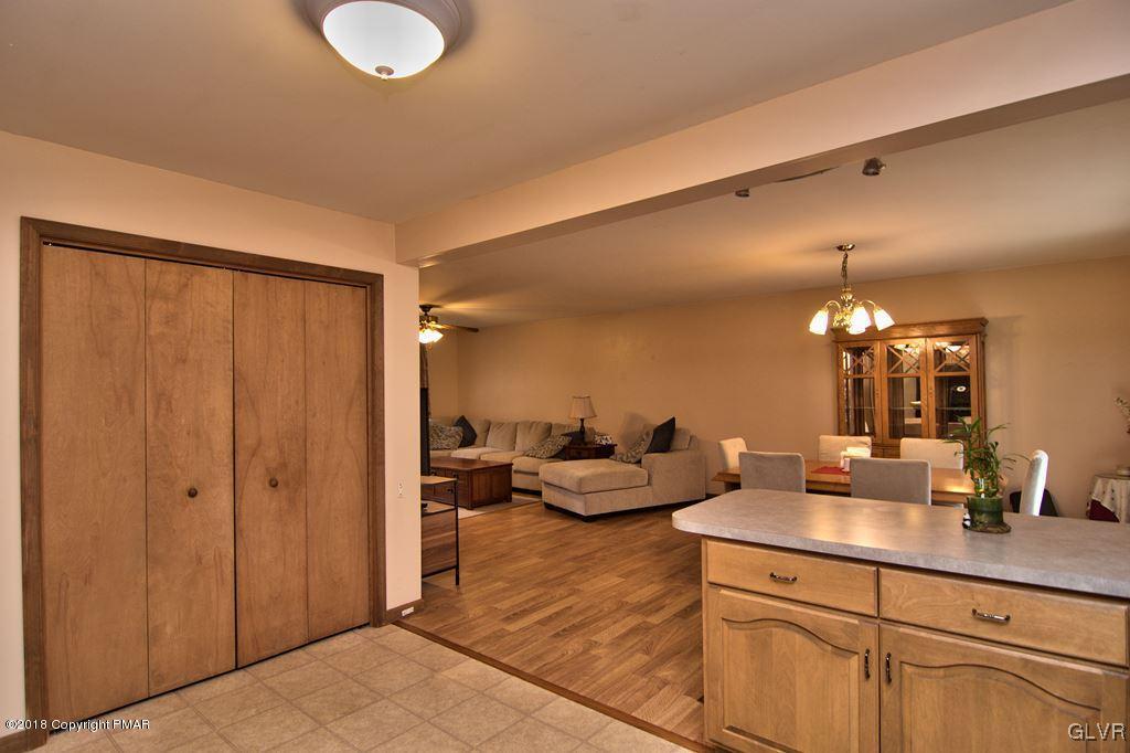 251 Devils Hole Road Cresco, PA 18326 - Photo 14 of 35 a spacious bathroom with a double vanity sink and a mirror