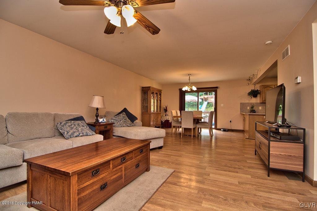 251 Devils Hole Road Cresco, PA 18326 - Photo 22 of 35 a living room with furniture and wooden floor