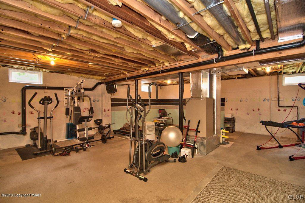 251 Devils Hole Road Cresco, PA 18326 - Photo 24 of 35 a view of a room with gym equipment