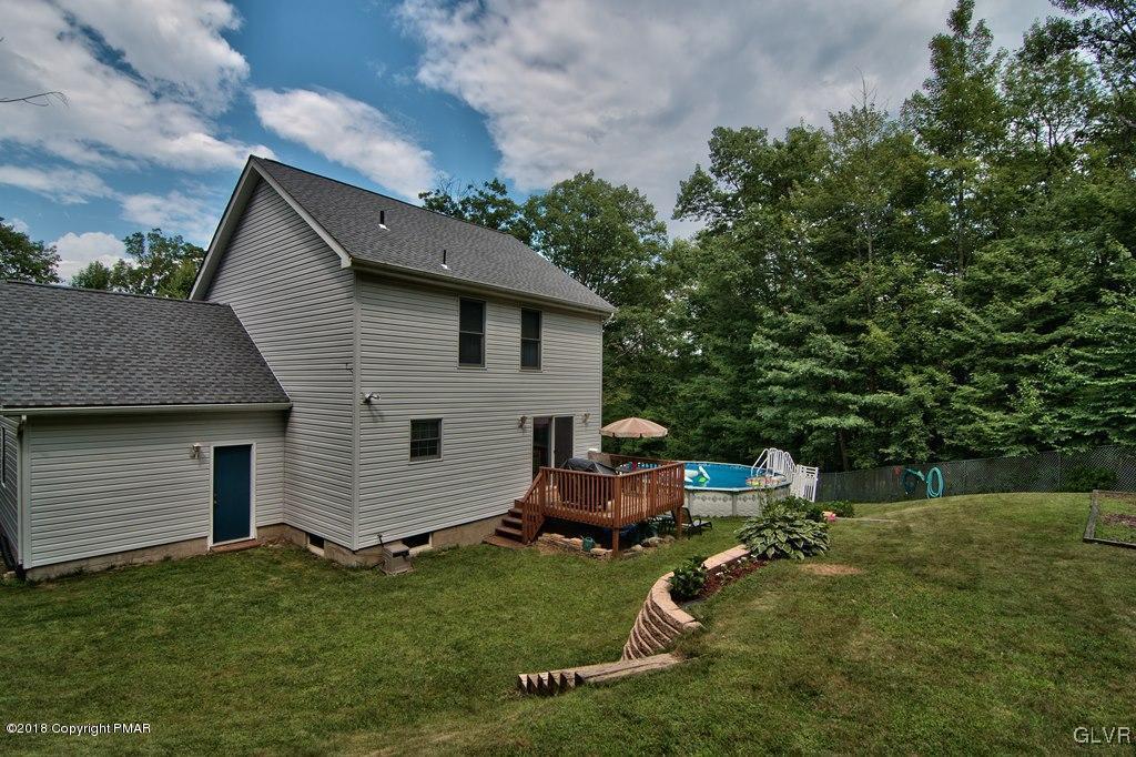 251 Devils Hole Road Cresco, PA 18326 - Photo 4 of 35 a house view with a garden space