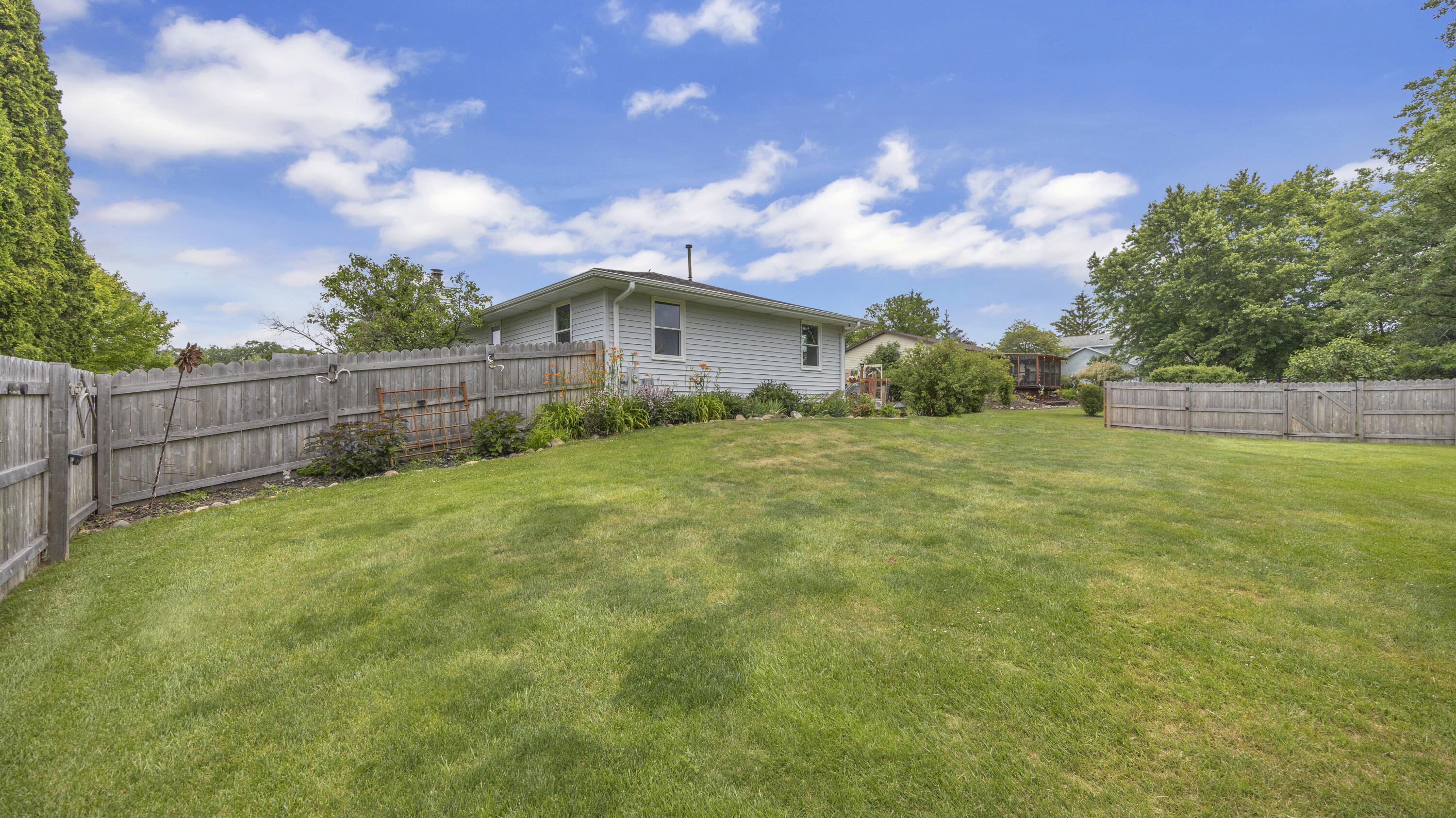 707 Goldfinch Lane Howards Grove, WI 53083 - Photo 24 of 27 Back Yard 1