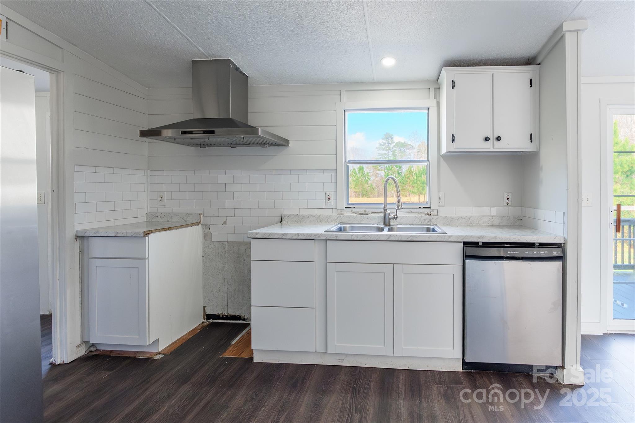 6315 Wingate Hill Road Denver, NC 28037 - Photo 12 of 21 a kitchen with a sink cabinets and window