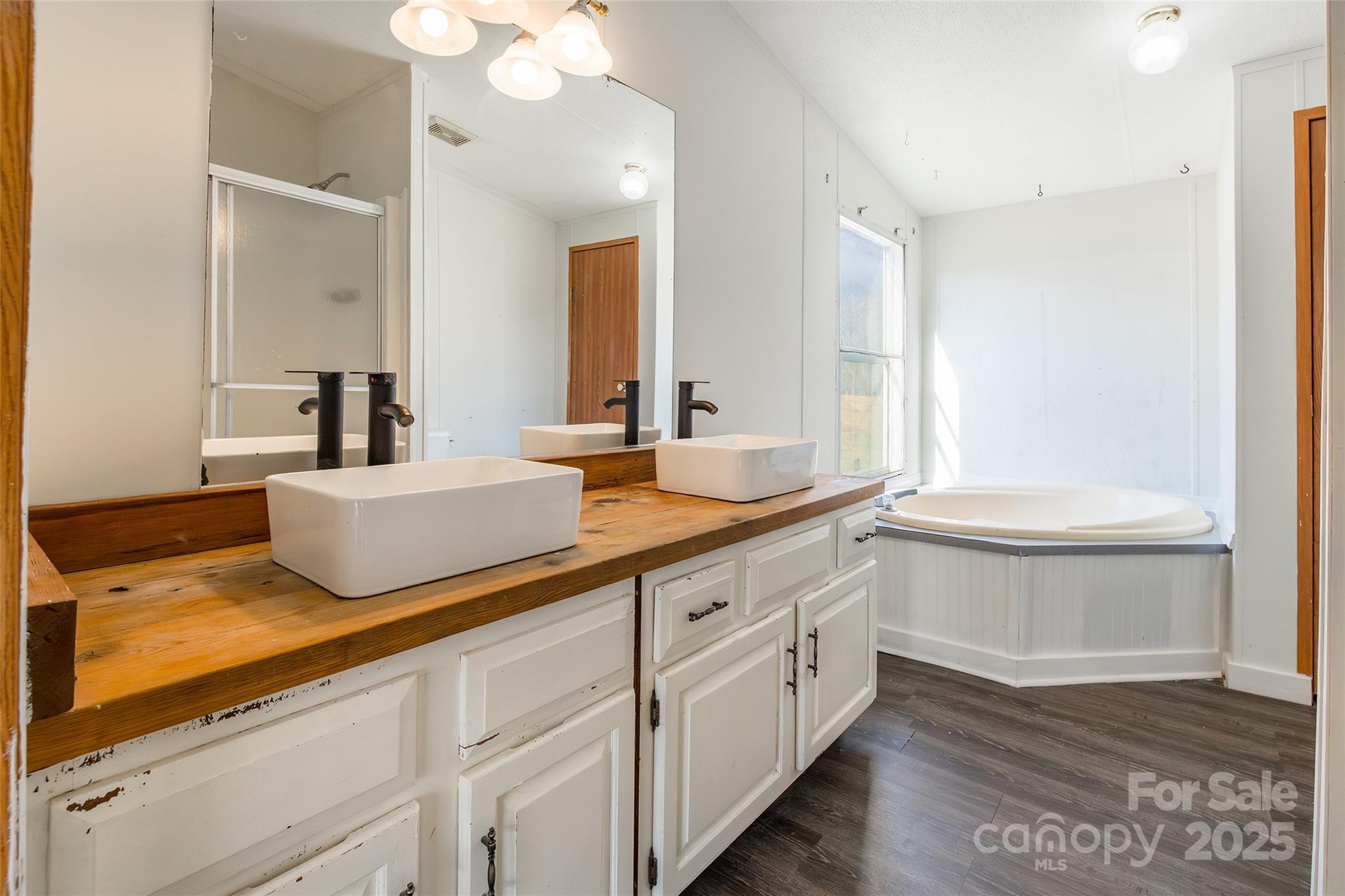 6315 Wingate Hill Road Denver, NC 28037 - Photo 17 of 21 a bathroom with a double vanity sink and a mirror