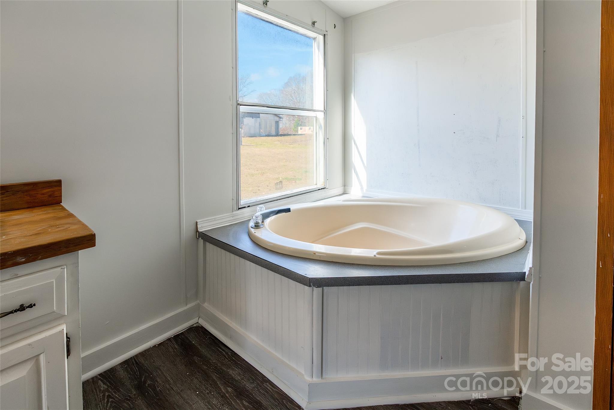 6315 Wingate Hill Road Denver, NC 28037 - Photo 18 of 21 a bathroom with a sink and a window